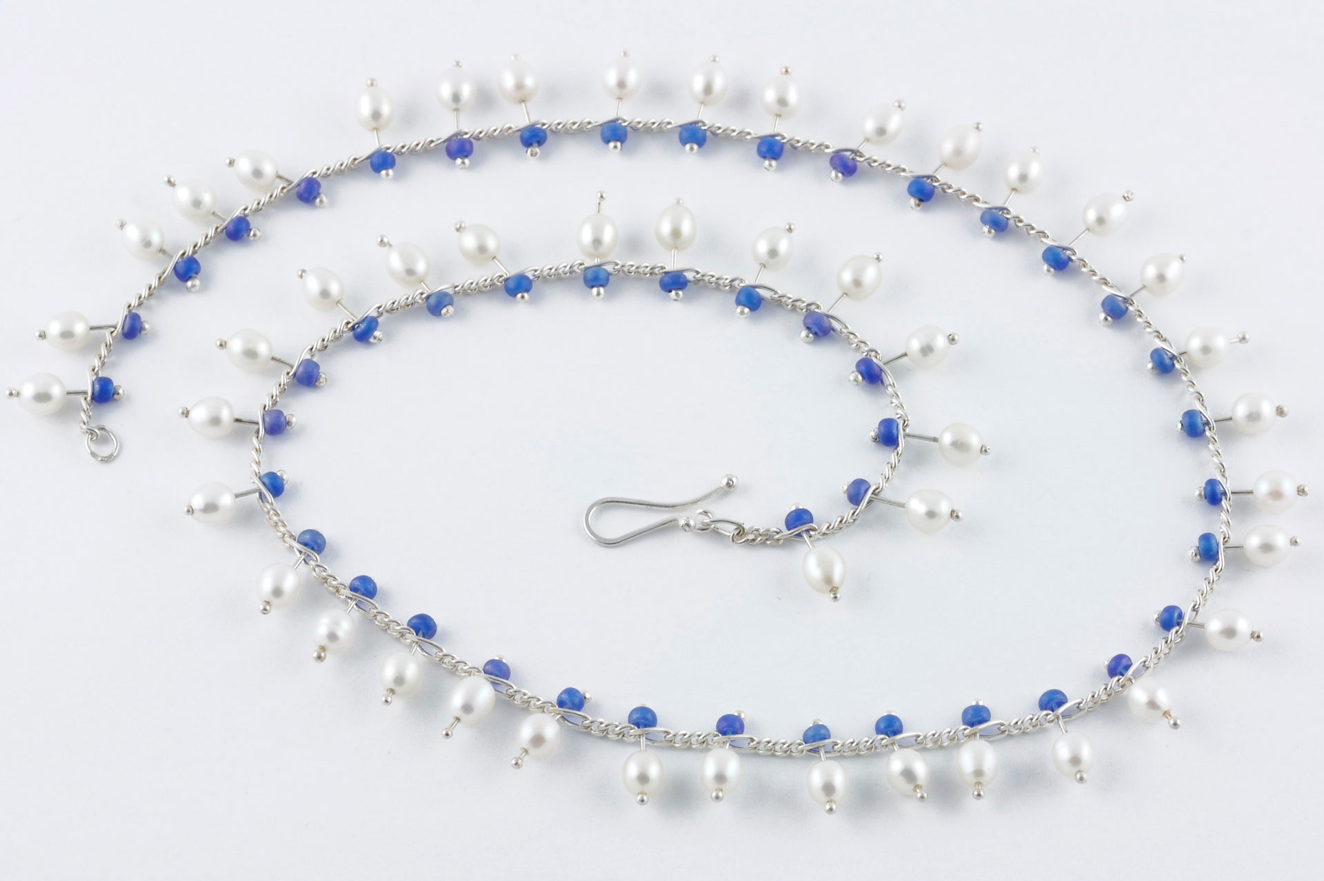 sita falkena figaro ketting met eivormige parels