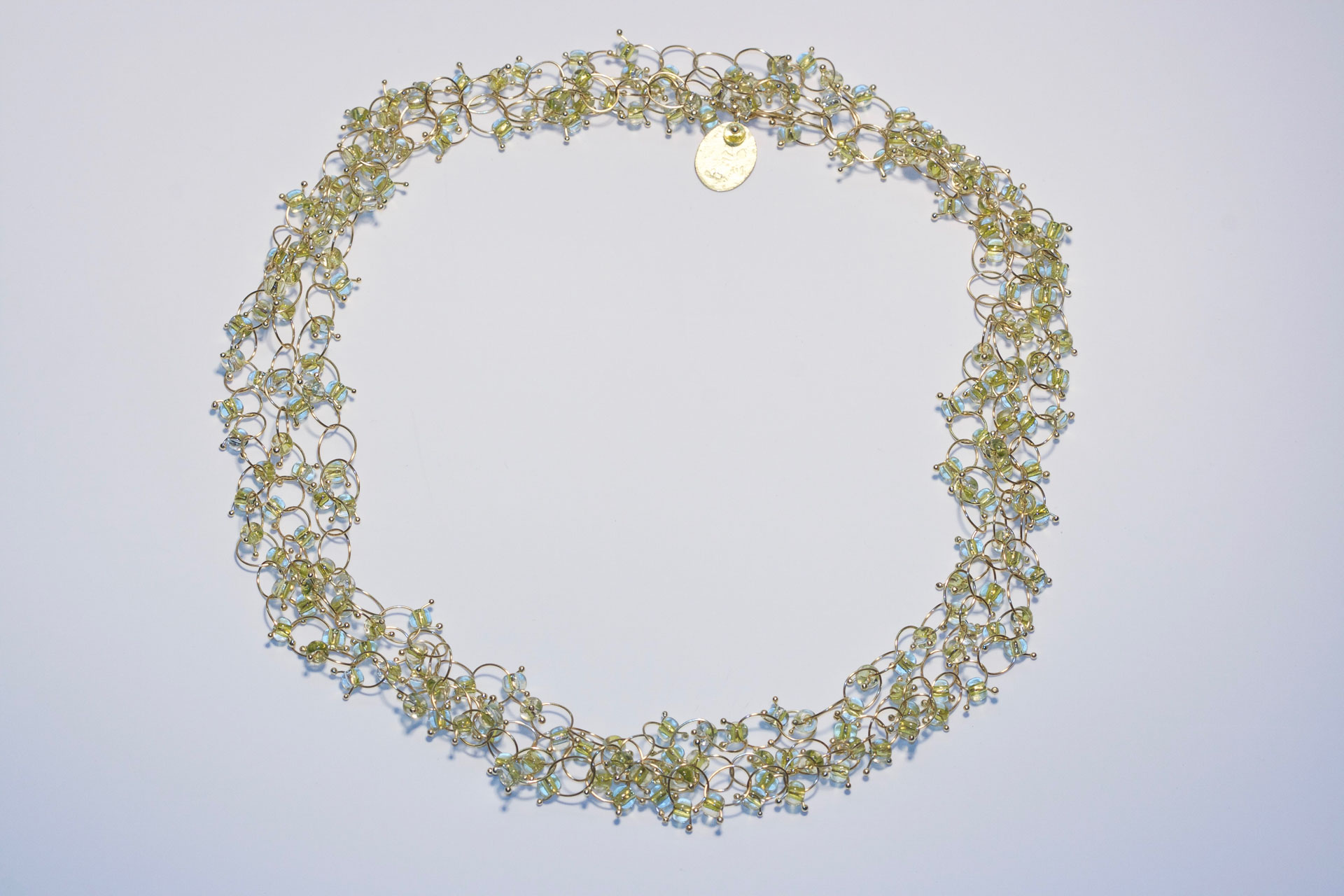sita falkena ringetjes collier goud groene glaskraal