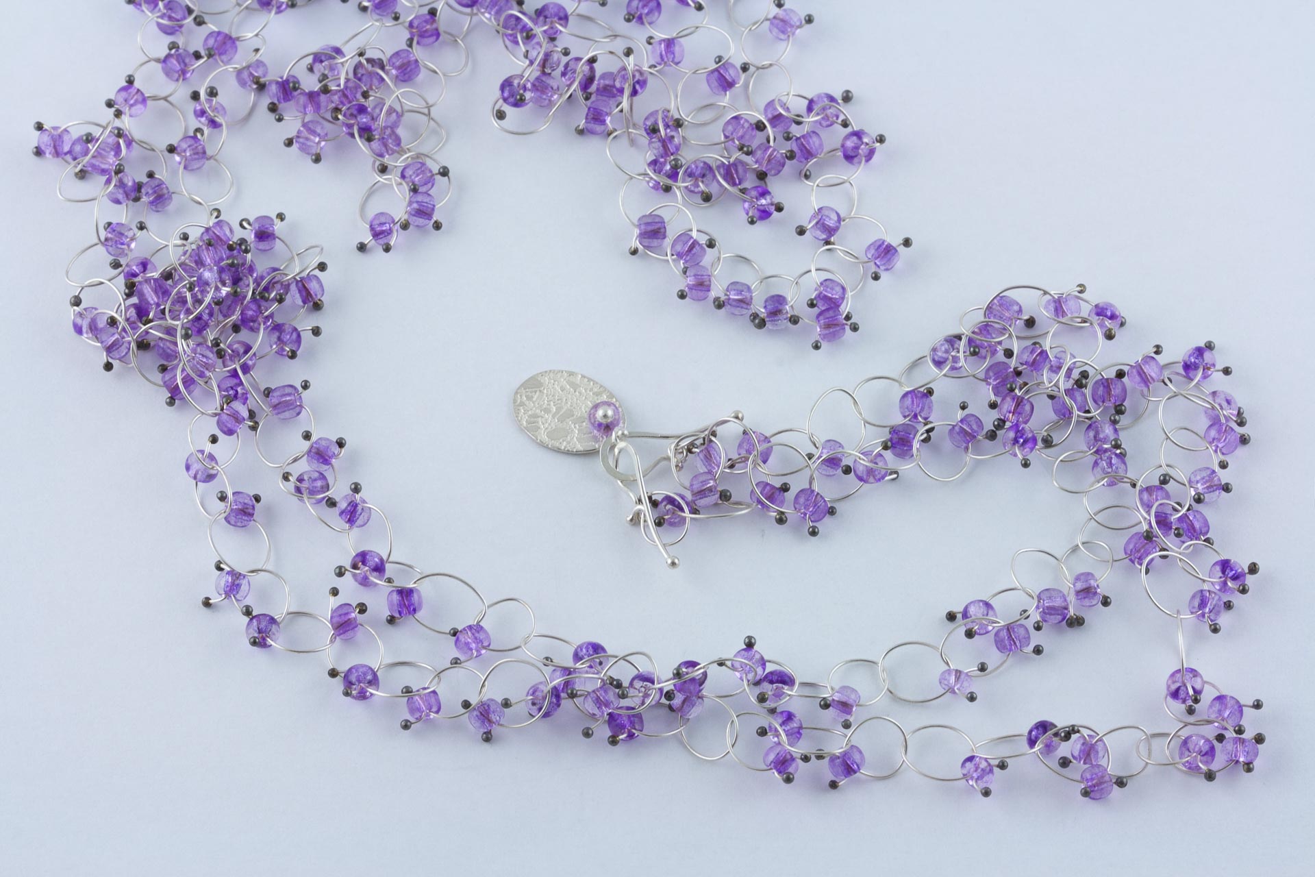sita falkena ringetjes collier zilver paars glas