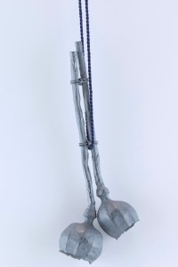 sita falkena klok met 2 papaverbolllen